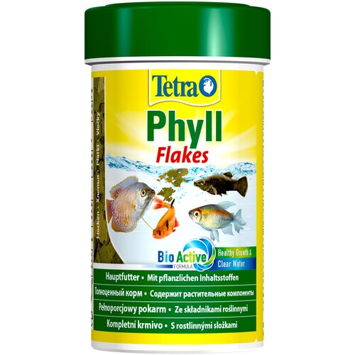 Корм Tetra Phyll Flakes 100 мл (хлопья) для всех видов травоядных рыб фото, описание